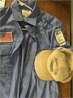 vintage Bassett chair fire brigade uniform and hat