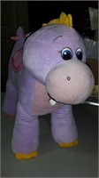 Plush purple riding  hippo shows some wear