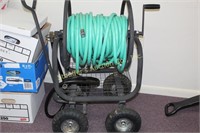 150 garden hose and metal carrier