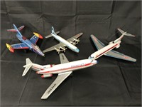 (4) Small Tin Litho Toy Airplanes