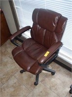 BROWN OFFICE CHAIR ON CASTERS