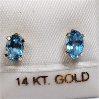 $200 14 KT Blue Topaz Earrings