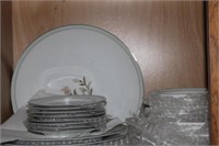 Jyoto "Clare" set of china on shelf in cupboard