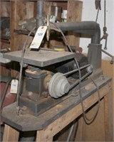 older table model jig saw on stand