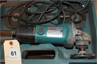 Makita 9523NBH 4" angle grinder in case