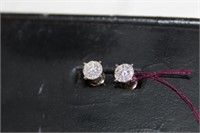 Pair of 14kt white Gold Diamond Earrings marked