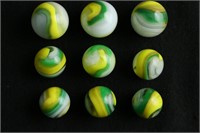 Group of 9 Yellow Green Popeye Marbles