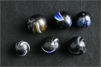 Group of 4 Indian Swirl Marbles. 2 Extras