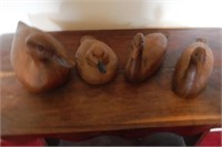 4 wooden ducks