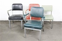 Four Mid Century Industrial Chairs