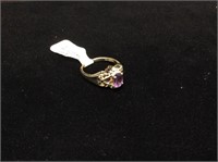 10kyg Ladies Amathyest Ring W/ Diamond Chips