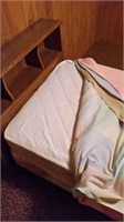 Single bed, bookcase headboard w/bedding