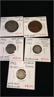 Five collectible coins from different countries