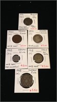 Six collectible coins from different countries
