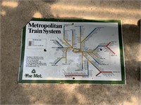 THE METROPOLITAN TRAIN SYSTEM ENAMEL SIGN