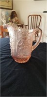 Iridescent pink pitcher with windmill design