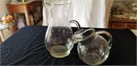 Etched glass pitchers with floral design