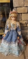Collectable porcelain doll approx 22 inches tall