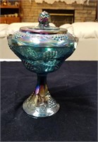 Carnival glass compote with grape and leaf