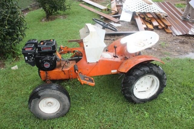 Online Auction: Bus, Lincoln Town Car, Tractor, More