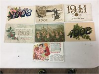 Lot of seven early Date postcards.