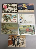 Lot of seven good Happy New Year’s postcards.