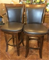 Two Leather Like Upholstered Bar Stools