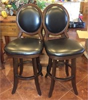 Two Leather Upholstered Bar Stools