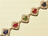 $1000. S/Silver Sapphire Emerald Ruby Bracelet
