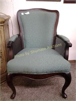 Green upholstered chair