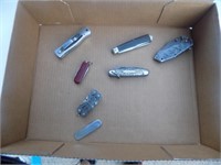 box of 7 pocket knives