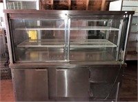 Pass through display case on refrigerated cabinet