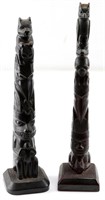 LOT TWO SMALL BLACK WOOD & RED WOOD TOTEM POLES
