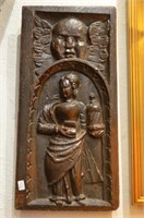 Three early figural carved oak panels