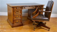 Double pedestal desk and leather chair