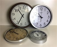 Four Round Wall Clocks