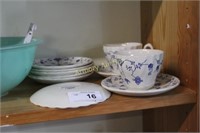 BLUE AND WHITE CUPS AND SAUCERS