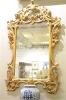 Antique carved giltwood framed mirror