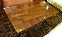 Rosewood and flame mahogany Regency low table