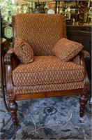 Rusty orange upholstered armchair