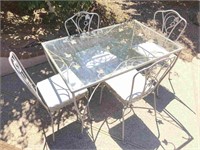 Wrought iron glass top patio table & chairs