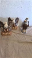 4 eagle figurines
