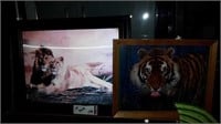 Pair of tiger and lion framed pictures