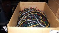 Box of Christmas lights & extension cords