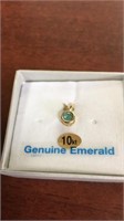 Yellow gold emerald pendant