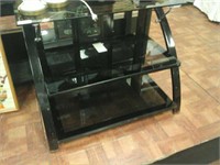 3 tear black glass tv stand