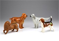 Four Beswick porcelain dog figures