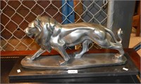 Silver painted, resin sculpture of a prowling