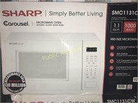 SHARP 1,1 CU FT MICROWAVE OVEN $149 RETAIL