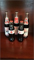 Assorted vintage Coca Cola bottles